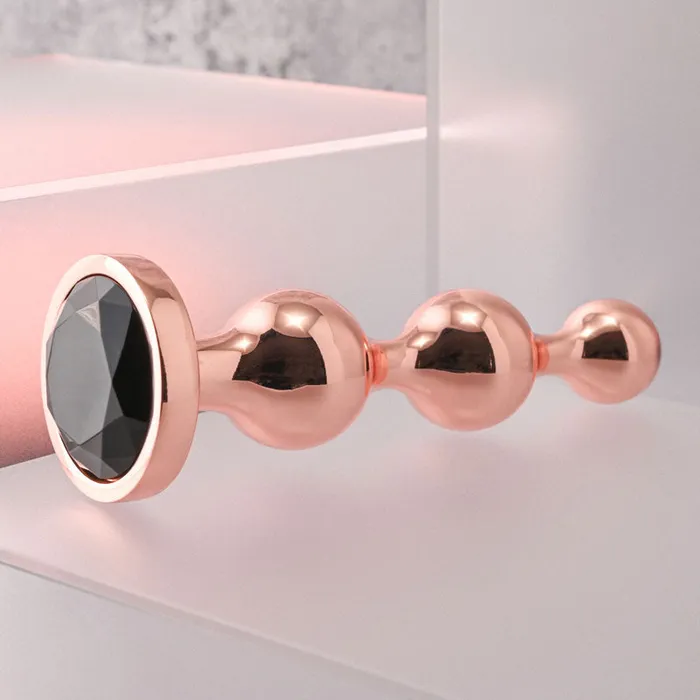 Gender X Anal | Gender X GOLD DIGGER Large - Rose Gold Large Butt Plug with Black Gem Base Gender X Anal | Gender X GOLD DIGGER Large - Rose Gold Large Butt Plug with Black Gem Base