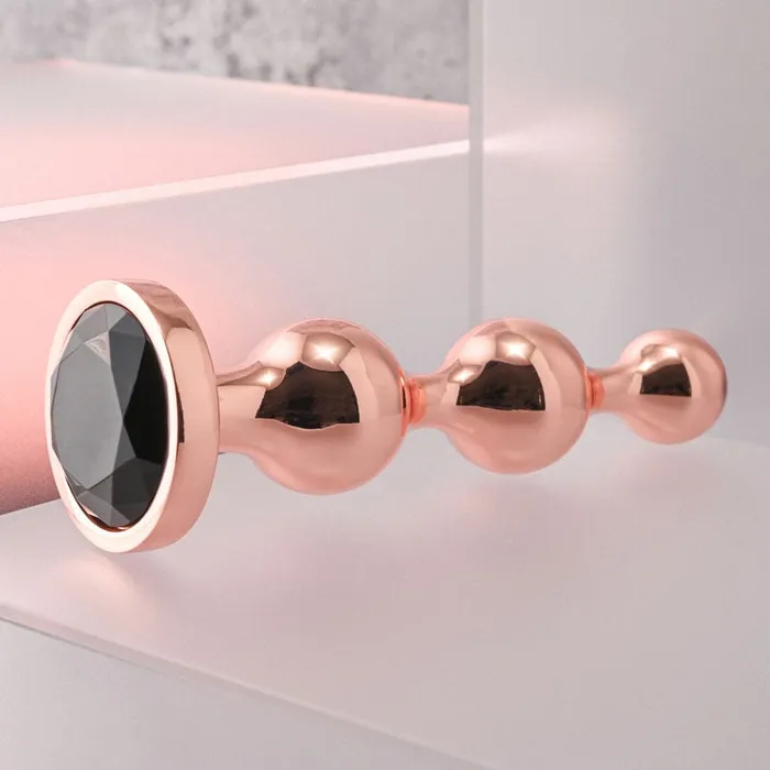 Gender X Anal | Gender X GOLD DIGGER Large - Rose Gold Large Butt Plug with Black Gem Base Gender X Anal | Gender X GOLD DIGGER Large - Rose Gold Large Butt Plug with Black Gem Base