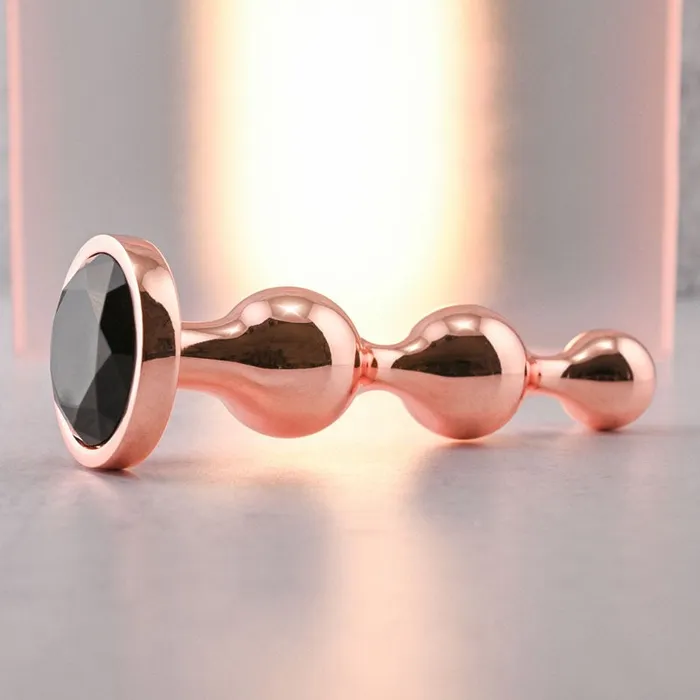 Gender X Anal | Gender X GOLD DIGGER Large - Rose Gold Large Butt Plug with Black Gem Base Gender X Anal | Gender X GOLD DIGGER Large - Rose Gold Large Butt Plug with Black Gem Base